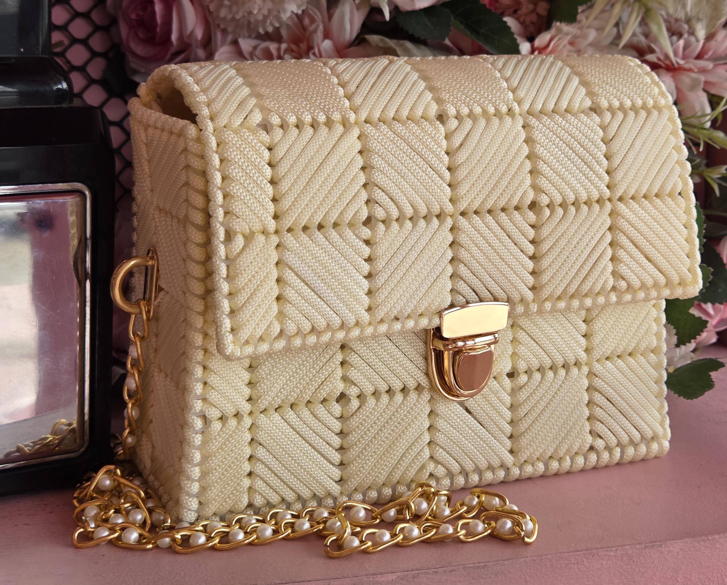 Bolsa Aurora em trama marfim com ferragem dourada